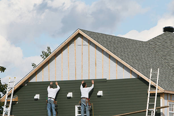 Professional Emergency Siding Repair technician working in Bridgeport, OH